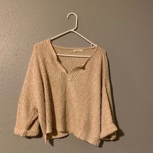 Cropped nude sweater